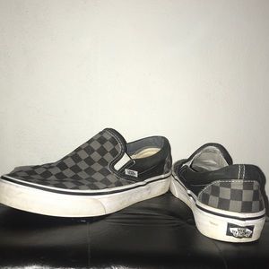 Gray and black checkered Vans